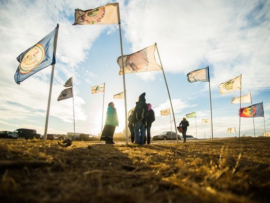lags fly at the Oceti Sakowin Camp in 2016, near Cannonball, North Dakota. Credit: Lucas Zhao / CC BY-NC 2.0